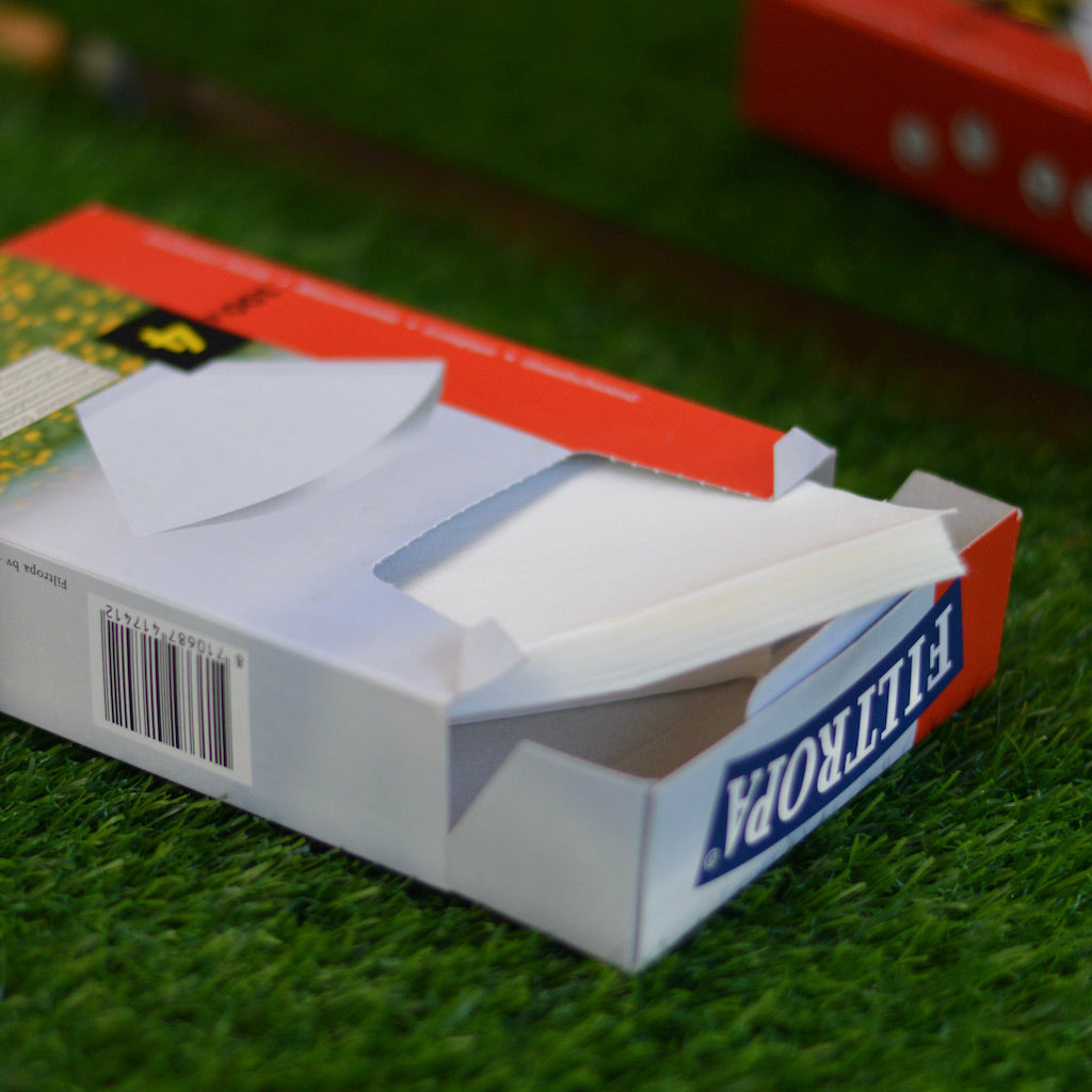 Photo of some Filtropa papers on a green counter top. 