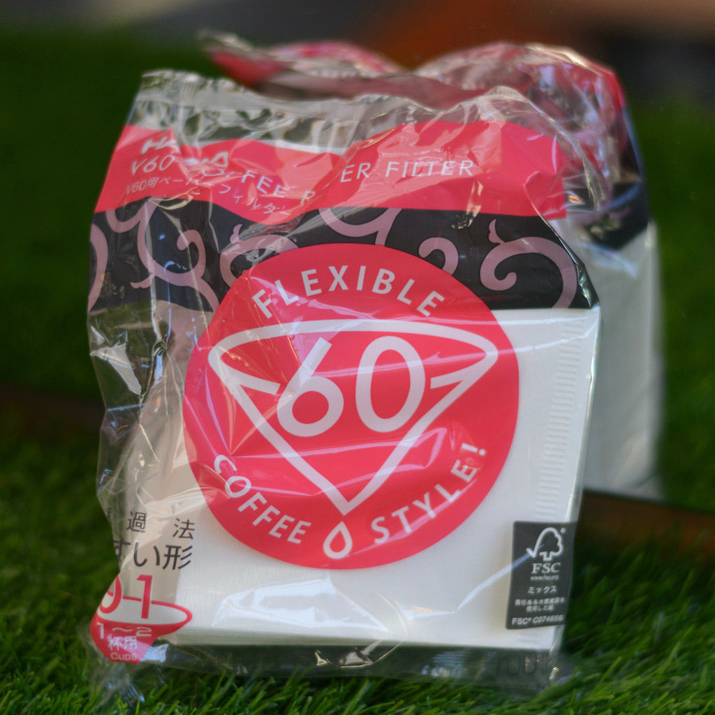 picture of a pack of Hario papers on a green counter