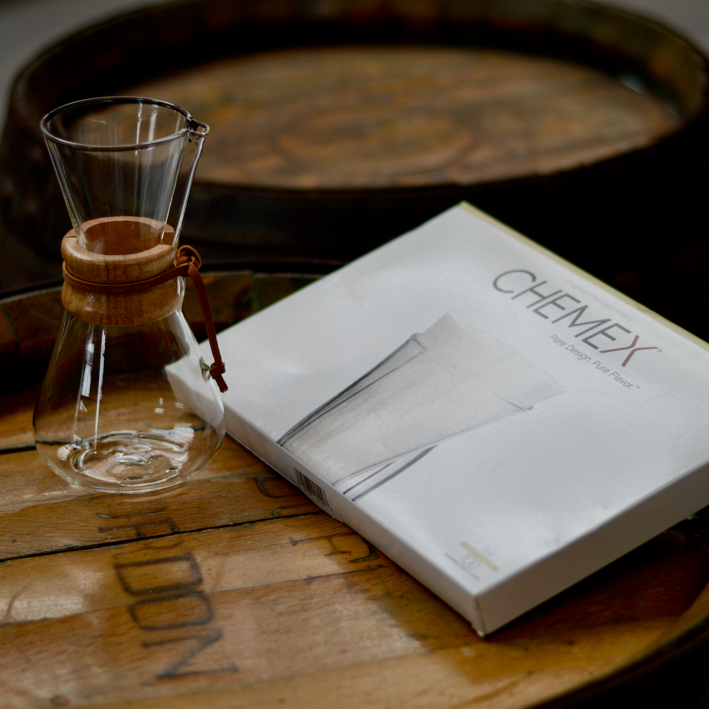 Chemex brewer and pack of filter papers. 